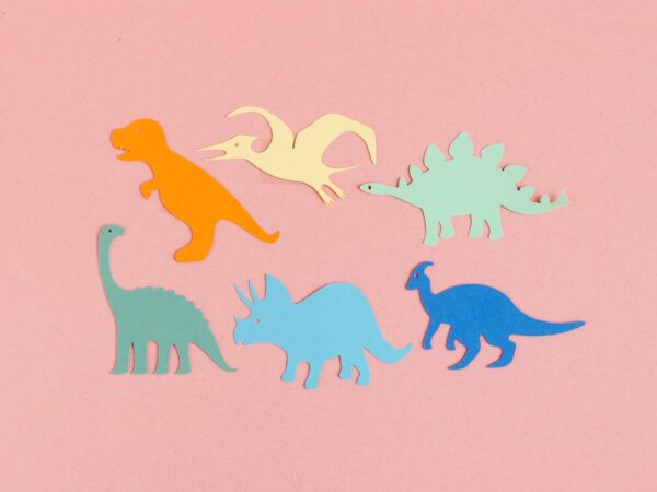 dinozaury na różowym tle